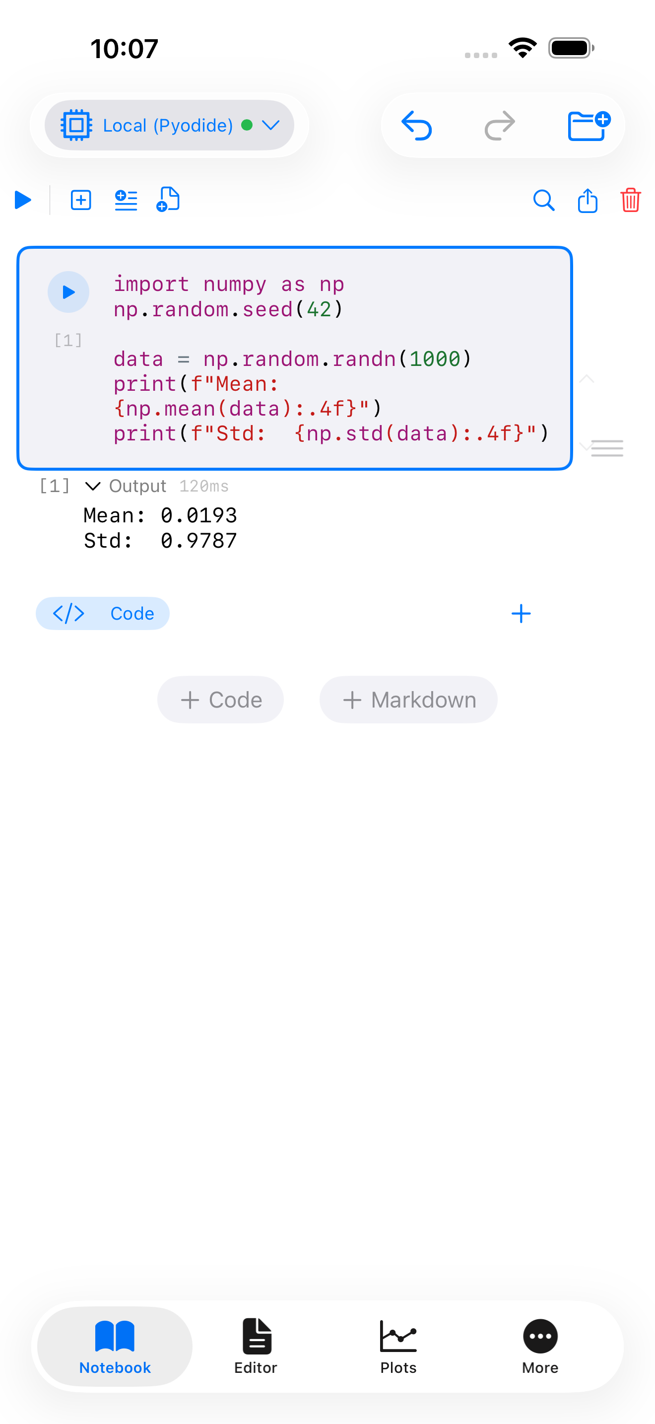 Code cell on iPhone running the numpy mean and std example with printed output